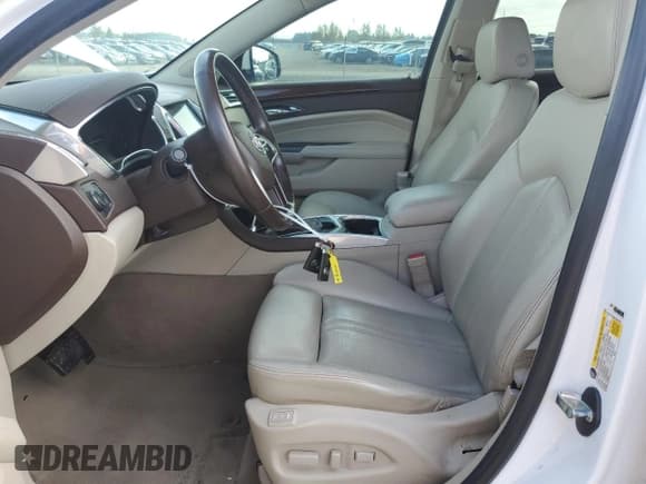 ✅ 2013 Cadillac SRX Premium Collection • VIN: 3GYFNJE39DS649339 • Лот: 83994355. Опубликован ранее на Copart с пробегом 104 618 миль. Бесплатный доступ к архиву аукционных продаж из США и подробный отчёт об истории автомобиля на DreamBid. Изображение 7.