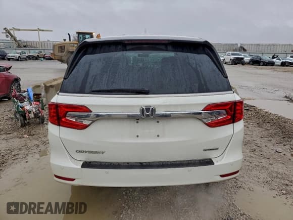 ✅ 2018 Honda Odyssey Touring • VIN: 5FNRL6H88JB053124 • Lot: 93779525. Wystawiony na Copart z przebiegiem 106 865 mil. Bezpłatny archiwum sprzedaży aukcyjnych z USA i szczegółowy raport historii pojazdu na DreamBid. Zdjęcie 6.