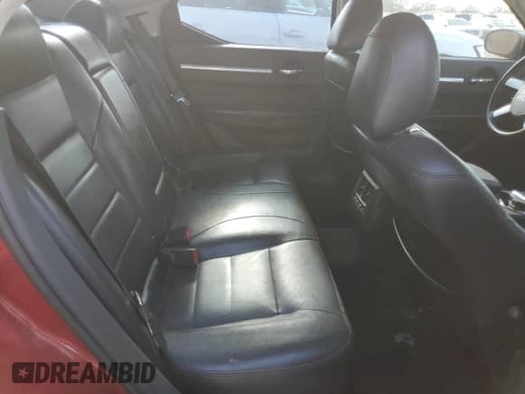 2009 Dodge Charger SXT with VIN 2B3KA33V49H601520, listed as a Copart auction lot 68101594 with 198,802 mi miles and Salvage title. Bid and sale history available at DreamBid. Image 11.