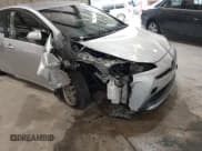 ✅ 2021 Toyota Prius L Eco • VIN: JTDKAMFUXM3144568 • Lot: 42689815. Listed on IAAI with 78,721 mi. Free auction sales archive from the USA and detailed vehicle history report at DreamBid. Image 6.