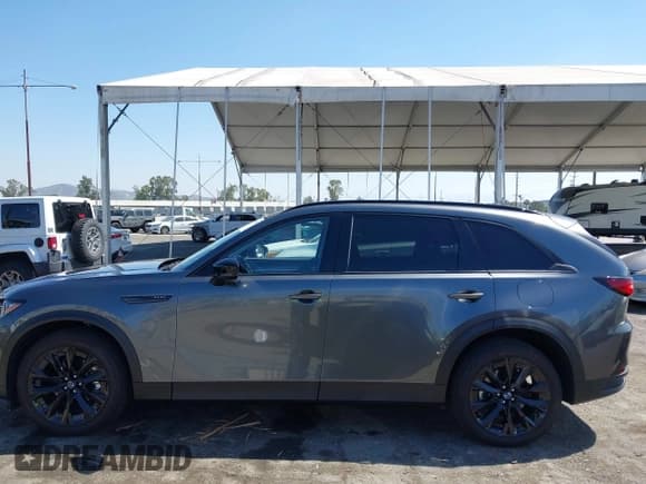 ✅ 2025 Mazda CX-90 Premium Sport • VIN: JM3KKCHAXS1206996 • Lot: 42086590. Listed on IAAI with 4,294 mi. Free auction sales archive from the USA and detailed vehicle history report at DreamBid. Image 14.