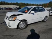 ✅ 2011 Kia Rio LX • VIN: KNADH4A31B6948446 • Lot: 76391634. Listed on Copart with 203,358 mi. Free auction sales archive from the USA and detailed vehicle history report at DreamBid. Image 1.