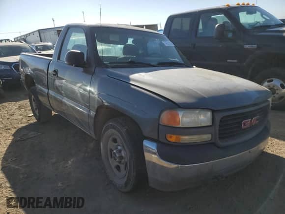 2002 GMC Sierra 1500 z VIN 1GTEC14W92Z280310, wystawiony jako Copart lot #74731204 z przebiegiem 241 075 mil mil oraz Szkoda całkowita • Salvage title. Historia ofert i sprzedaży dostępna na DreamBid. Obrazek 4.