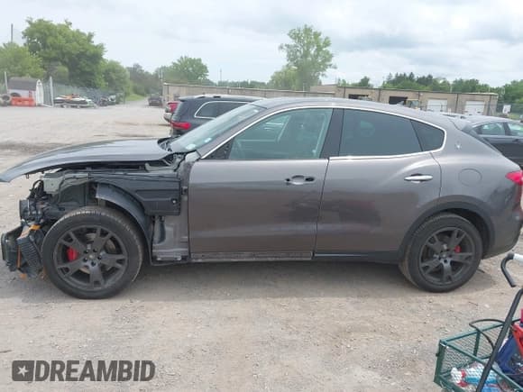 ✅ 2018 Maserati Levante • VIN: ZN661XUA2JX297461 • Lot: 42671491. Listed on IAAI with 96,952 mi. Free auction sales archive from the USA and detailed vehicle history report at DreamBid. Image 14.