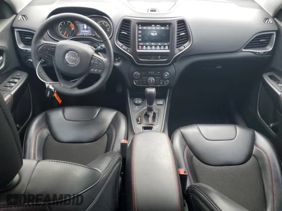 ✅ 2022 Jeep Cherokee Trailhawk • VIN: 1C4PJMBX1ND529146 • Lot: 56237365. Listed on Copart with 26,718 mi. Free auction sales archive from the USA and detailed vehicle history report at DreamBid. Image 8.