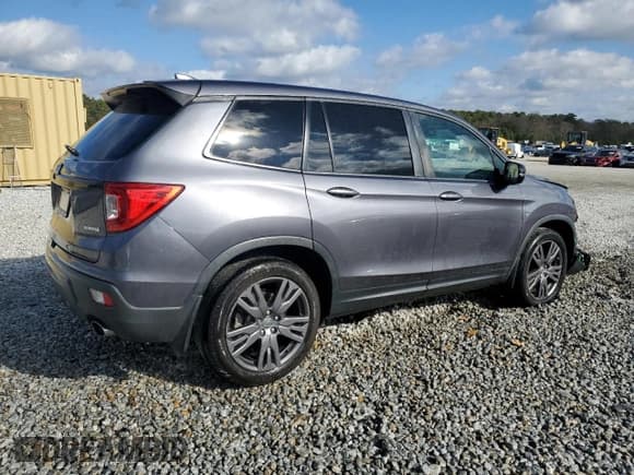 ✅ 2019 Honda Passport EX-L • VIN: 5FNYF7H5XKB001901 • Lot: 87186504. Listed on Copart with 93,540 mi. Free auction sales archive from the USA and detailed vehicle history report at DreamBid. Image 3.