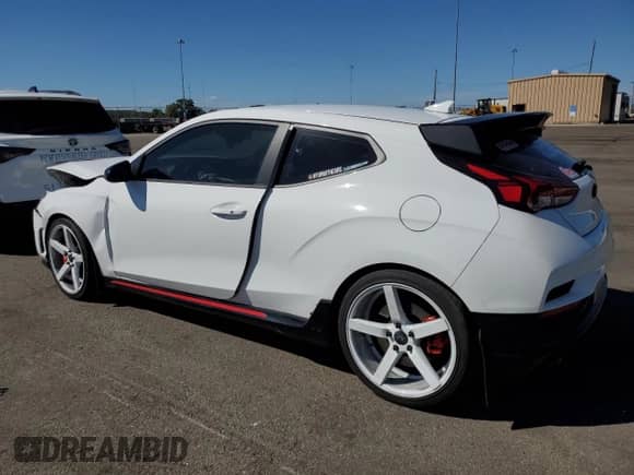 2022 Hyundai Veloster z VIN KMHT36AH7NU012816, wystawiony jako Copart lot #70498895 z przebiegiem 24 679 mil mil oraz Szkoda całkowita • Salvage title. Historia ofert i sprzedaży dostępna na DreamBid. Obrazek 2.