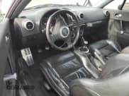 ✅ 2003 Audi TT • VIN: TRUWT28N131019058 • Lot: 87118744. Listed on Copart with 164,154 mi. Free auction sales archive from the USA and detailed vehicle history report at DreamBid. Image 8.