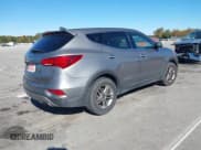 ✅ 2017 Hyundai Santa Fe 2.4L • VIN: 5XYZTDLB3HG406153 • Lot: 43528317. Listed on IAAI with 170,040 mi. Free auction sales archive from the USA and detailed vehicle history report at DreamBid. Image 4.