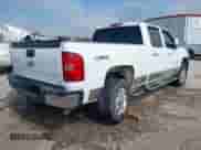 2013 Chevrolet Silverado 2500HD LTZ with VIN 1GC1KYCG7DF151006, listed as a IAAI auction lot 43263484 with 129,989 mi miles and . Bid and sale history available at DreamBid. Image 4.