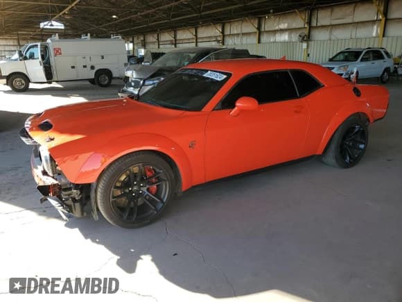✅ 2022 Dodge Challenger SRT Hellcat Redeye Widebody • VIN: 2C3CDZL99NH242003 • Lot: 38351624. Wystawiony na Copart z przebiegiem 6 876 mil. Bezpłatny archiwum sprzedaży aukcyjnych z USA i szczegółowy raport historii pojazdu na DreamBid. Zdjęcie 1.