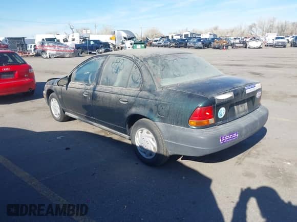 1998 Saturn SL z VIN 1G8ZF5287WZ294842, wystawiony jako IAAI lot #41726012 z przebiegiem 170 385 mil mil oraz . Historia ofert i sprzedaży dostępna na DreamBid. Obrazek 3.