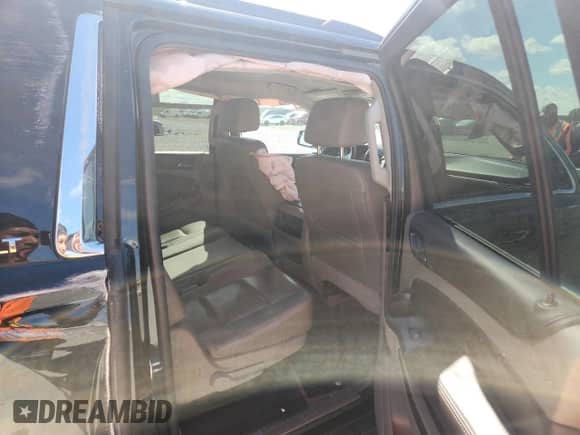 2019 Chevrolet Suburban LT z VIN 1GNSCHKCXKR161435, wystawiony jako Copart lot #90894635 z przebiegiem 189 459 mil mil oraz Czysty tytuł • Clean title. Historia ofert i sprzedaży dostępna na DreamBid. Obrazek 11.