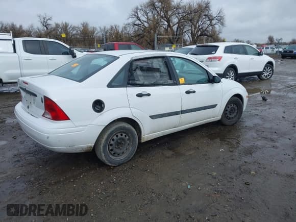 ✅ 2003 Ford Focus LX • VIN: 1FAFP33PX3W181700 • Lot: 41910086. Listed on IAAI with 139,777 mi. Free auction sales archive from the USA and detailed vehicle history report at DreamBid. Image 4.
