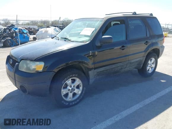 ✅ 2005 Ford Escape XLT • VIN: 1FMYU93135KB23105 • Lot: 41849131. Listed on IAAI with 164,645 mi. Free auction sales archive from the USA and detailed vehicle history report at DreamBid. Image 2.