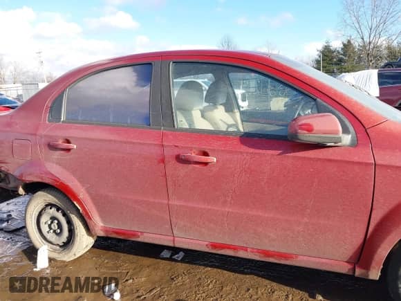 2011 Chevrolet Aveo 1LT z VIN KL1TD5DE5BB134392, wystawiony jako IAAI lot #41352555 z przebiegiem 153 160 mil mil oraz . Historia ofert i sprzedaży dostępna na DreamBid. Obrazek 14.