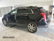 ✅ 2016 Cadillac SRX • VIN: 3GYFNAE38GS530976 • Lot: 61811775. Wystawiony na Copart z przebiegiem 220 745 mil. Bezpłatny archiwum sprzedaży aukcyjnych z USA i szczegółowy raport historii pojazdu na DreamBid. Zdjęcie 2.