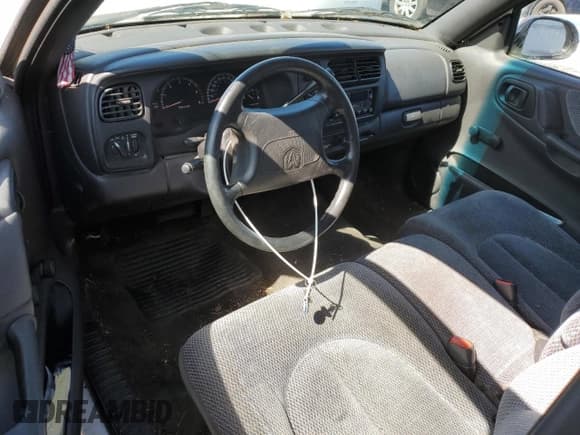 ✅ 1999 Dodge Dakota SLT • VIN: 1B7GL22X0XS174449 • Lot: 49894855. Wystawiony na Copart z przebiegiem 74 729 mil. Bezpłatny archiwum sprzedaży aukcyjnych z USA i szczegółowy raport historii pojazdu na DreamBid. Zdjęcie 8.