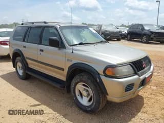 ✅ 2001 Mitsubishi Montero Sport ES • VIN: JA4MT21H21P039801 • Lot: 42127950. Wystawiony na IAAI z przebiegiem 239 148 mil. Bezpłatny archiwum sprzedaży aukcyjnych z USA i szczegółowy raport historii pojazdu na DreamBid. Zdjęcie 1.