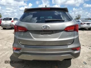 ✅ 2017 Hyundai Santa Fe 2.4L • VIN: 5XYZT3LB3HG398002 • Лот: 69221364. Опубликован ранее на Copart с пробегом 83 383 миль. Бесплатный доступ к архиву аукционных продаж из США и подробный отчёт об истории автомобиля на DreamBid. Изображение 6.