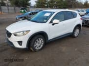 ✅ 2013 Mazda CX-5 Touring • VIN: JM3KE2CEXD0148702 • Lot: 43877352. Listed on IAAI with 183,342 mi. Free auction sales archive from the USA and detailed vehicle history report at DreamBid. Image 2.