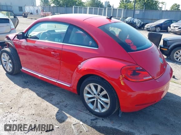 ✅ 2014 Volkswagen Beetle 2.0L TDI w/Sun/Sound/Nav • VIN: 3VWJL7AT6EM634671 • Лот: 42921278. Опубликован ранее на IAAI с пробегом 48 985 миль. Бесплатный доступ к архиву аукционных продаж из США и подробный отчёт об истории автомобиля на DreamBid. Изображение 3.