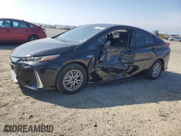 ✅ 2022 Toyota Prius LE • VIN: JTDKAMFP4N3204548 • Лот: 91313585. Опубликован ранее на Copart с пробегом 80 782 миль. Бесплатный доступ к архиву аукционных продаж из США и подробный отчёт об истории автомобиля на DreamBid. Изображение 1.