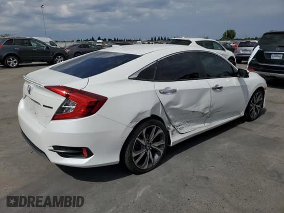 ✅ 2019 Honda Civic Touring • VIN: 19XFC1F91KE200070 • Лот: 81516515. Опубликован ранее на Copart с пробегом 81 775 миль. Бесплатный доступ к архиву аукционных продаж из США и подробный отчёт об истории автомобиля на DreamBid. Изображение 3.