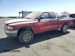 ✅ 1999 Dodge Dakota SLT • VIN: 1B7GG22X5XS215601 • Lot: 80686715. Wystawiony na Copart z przebiegiem 273 332 mil. Bezpłatny archiwum sprzedaży aukcyjnych z USA i szczegółowy raport historii pojazdu na DreamBid. Zdjęcie 1.
