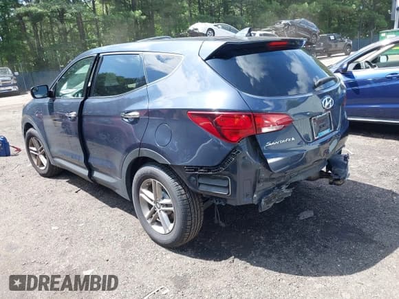✅ 2017 Hyundai Santa Fe 2.4L • VIN: 5XYZTDLB9HG441313 • Lot: 42742060. Listed on IAAI with 68,089 mi. Free auction sales archive from the USA and detailed vehicle history report at DreamBid. Image 3.