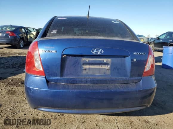 2007 Hyundai Accent GLS z VIN KMHCN46C97U087015, wystawiony jako Copart lot #90054475 z przebiegiem 108 428 mil mil oraz Szkoda całkowita • Salvage title. Historia ofert i sprzedaży dostępna na DreamBid. Obrazek 6.