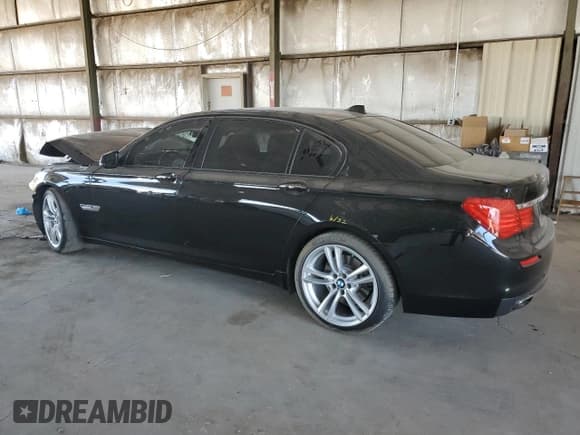 ✅ 2011 BMW 7 Series 740Li • VIN: WBAKB4C56BC574666 • Лот: 81853495. Опубликован ранее на Copart с пробегом 98 031 миль. Бесплатный доступ к архиву аукционных продаж из США и подробный отчёт об истории автомобиля на DreamBid. Изображение 2.