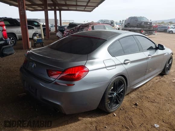 ✅ 2014 BMW 6 Series 640i • VIN: WBA6A0C58ED317570 • Lot: 41602084. Listed on IAAI with 94,271 mi. Free auction sales archive from the USA and detailed vehicle history report at DreamBid. Image 4.