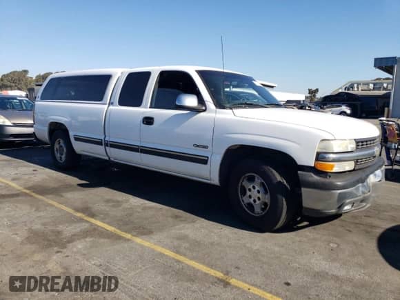 2002 Chevrolet Silverado 1500 with VIN 1GCEC19T02E150146, listed as a Copart auction lot 77425664 with 295,228 mi miles and Salvage title. Bid and sale history available at DreamBid. Image 4.