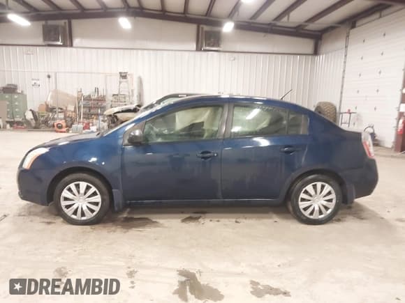 ✅ 2009 Nissan Sentra S FE+ • VIN: 3N1AB61E89L666618 • Лот: 42317924. Опубликован ранее на IAAI с пробегом 91 076 миль. Бесплатный доступ к архиву аукционных продаж из США и подробный отчёт об истории автомобиля на DreamBid. Изображение 14.