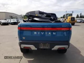 ✅ 2022 Rivian R1T Launch Edition • VIN: 7FCTGAAL1NN002786 • Lot: 67317584. Listed on Copart with 41,988 mi. Free auction sales archive from the USA and detailed vehicle history report at DreamBid. Image 6.