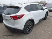 ✅ 2016 Mazda CX-5 Grand Touring • VIN: JM3KE4DY6G0873688 • Lot: 43565324. Wystawiony na IAAI z przebiegiem 80 920 mil. Bezpłatny archiwum sprzedaży aukcyjnych z USA i szczegółowy raport historii pojazdu na DreamBid. Zdjęcie 4.