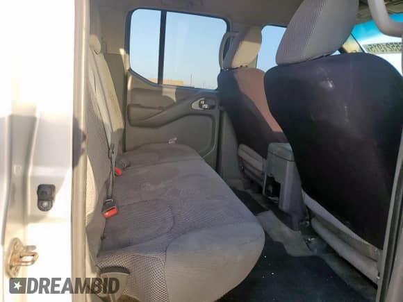 2015 Nissan Frontier SV z VIN 1N6AD0FV4FN762929, wystawiony jako Copart lot #65521915 z przebiegiem 197 641 mil mil oraz Czysty tytuł • Clean title. Historia ofert i sprzedaży dostępna na DreamBid. Obrazek 11.