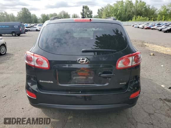 2012 Hyundai Santa Fe GLS с VIN 5XYZGDAB8CG093309, выставлен на аукционе Copart как лот 67392274 с пробегом 118 241 миль миль и Списание • Salvage title. История ставок и продаж доступна на DreamBid. Изображение 6.