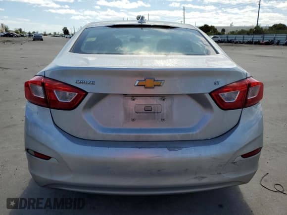 ✅ 2018 Chevrolet Cruze LT • VIN: 1G1BE5SM1J7175298 • Лот: 42111063. Опубликован ранее на Copart с пробегом 63 846 миль. Бесплатный доступ к архиву аукционных продаж из США и подробный отчёт об истории автомобиля на DreamBid. Изображение 6.