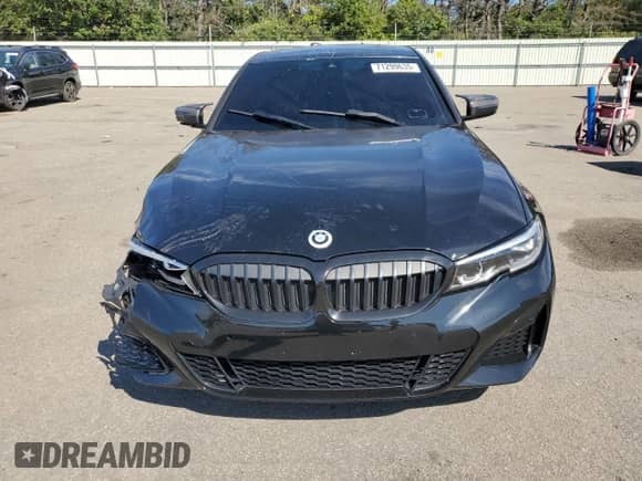 2022 BMW 3 Series 330i xDrive z VIN 3MW5R7J05N8C70306, wystawiony jako Copart lot #71299635 z przebiegiem 42 128 mil mil oraz Szkoda całkowita • Salvage title. Historia ofert i sprzedaży dostępna na DreamBid. Obrazek 5.