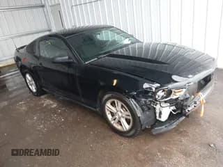 ✅ 2012 Ford Mustang Premium • VIN: 1ZVBP8AM8C5258081 • Lot: 42605779. Listed on IAAI with 116,916 mi. Free auction sales archive from the USA and detailed vehicle history report at DreamBid. Image 1.