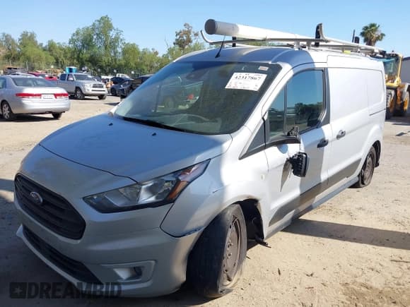 ✅ 2021 Ford Transit Connect XLT • VIN: NM0LS7F26M1502372 • Lot: 42317867. Listed on IAAI with 105,069 mi. Free auction sales archive from the USA and detailed vehicle history report at DreamBid. Image 2.