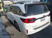 ✅ 2025 Honda Odyssey Touring • VIN: 5FNRL6H83SB005645 • Lot: 43507137. Listed on IAAI with 6,051 mi. Free auction sales archive from the USA and detailed vehicle history report at DreamBid. Image 3.