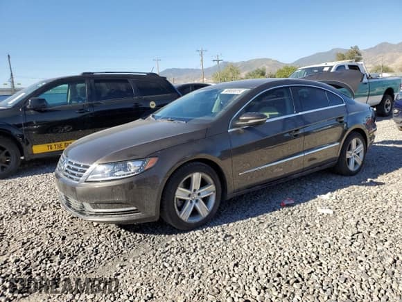 ✅ 2015 Volkswagen CC Sport • VIN: WVWBP7AN2FE802598 • Лот: 68955875. Опубликован ранее на Copart с пробегом 110 437 миль. Бесплатный доступ к архиву аукционных продаж из США и подробный отчёт об истории автомобиля на DreamBid. Изображение 1.