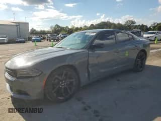 2019 Dodge Charger SXT z VIN 2C3CDXBG4KH666902, wystawiony jako Copart lot #84268455 z przebiegiem 92 712 mil mil oraz Szkoda całkowita • Salvage title. Historia ofert i sprzedaży dostępna na DreamBid. Obrazek 1.