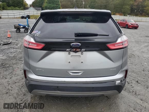 ✅ 2023 Ford Edge SEL • VIN: 2FMPK4J98PBA38352 • Lot: 82719145. Listed on Copart with 71,419 mi. Free auction sales archive from the USA and detailed vehicle history report at DreamBid. Image 6.