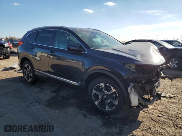 ✅ 2019 Honda CR-V Touring • VIN: 2HKRW2H99KH602146 • Lot: 90425595. Listed on Copart with Not provided. Free auction sales archive from the USA and detailed vehicle history report at DreamBid. Image 4.