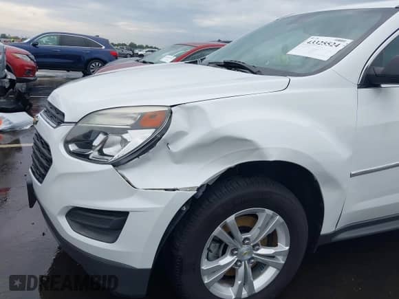 2017 Chevrolet Equinox LS z VIN 2GNALBEK0H1532261, wystawiony jako IAAI lot #43325524 z przebiegiem 90 274 mil mil oraz . Historia ofert i sprzedaży dostępna na DreamBid. Obrazek 6.