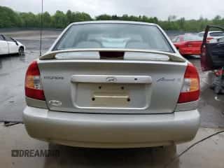 2002 Hyundai Accent GL with VIN KMHCG45C12U355561, listed as a Copart auction lot 54546945 with 22,893 mi miles and Salvage title. Bid and sale history available at DreamBid. Image 6.